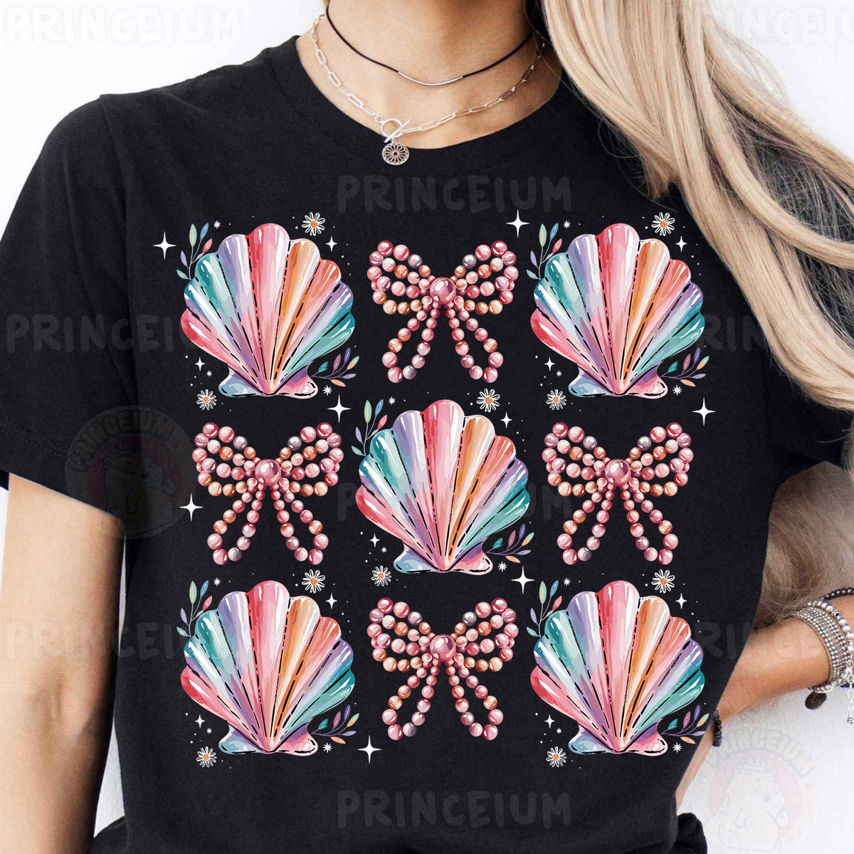 a woman wearing a black t - shirt with pink, green, blue, and
