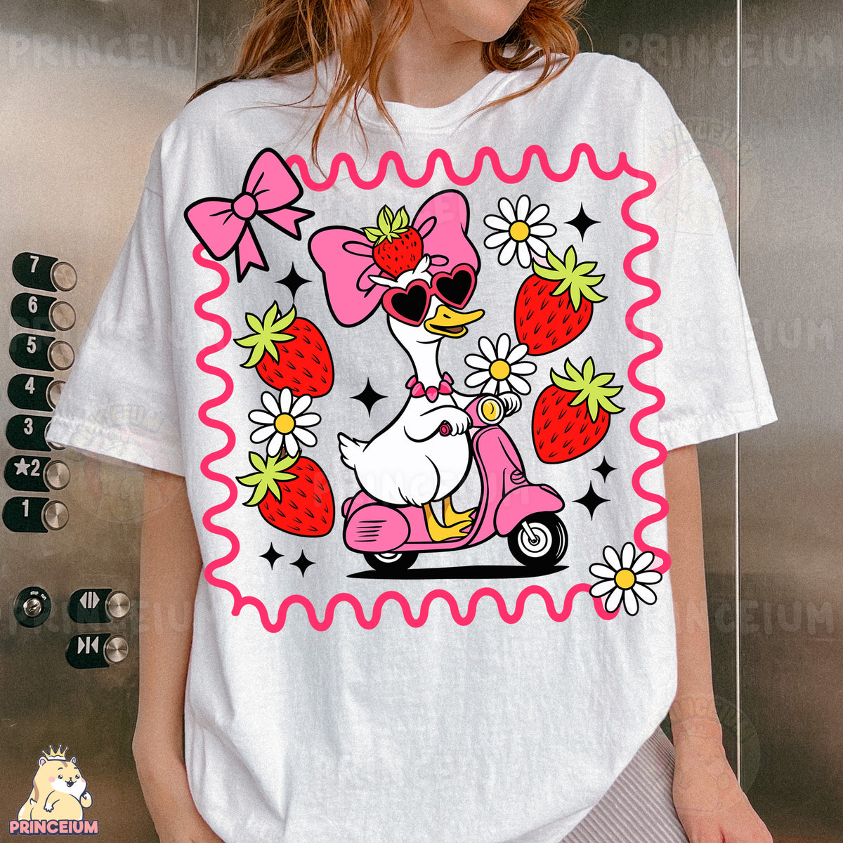 a woman wearing a t - shirt with a picture of a dog riding a sc