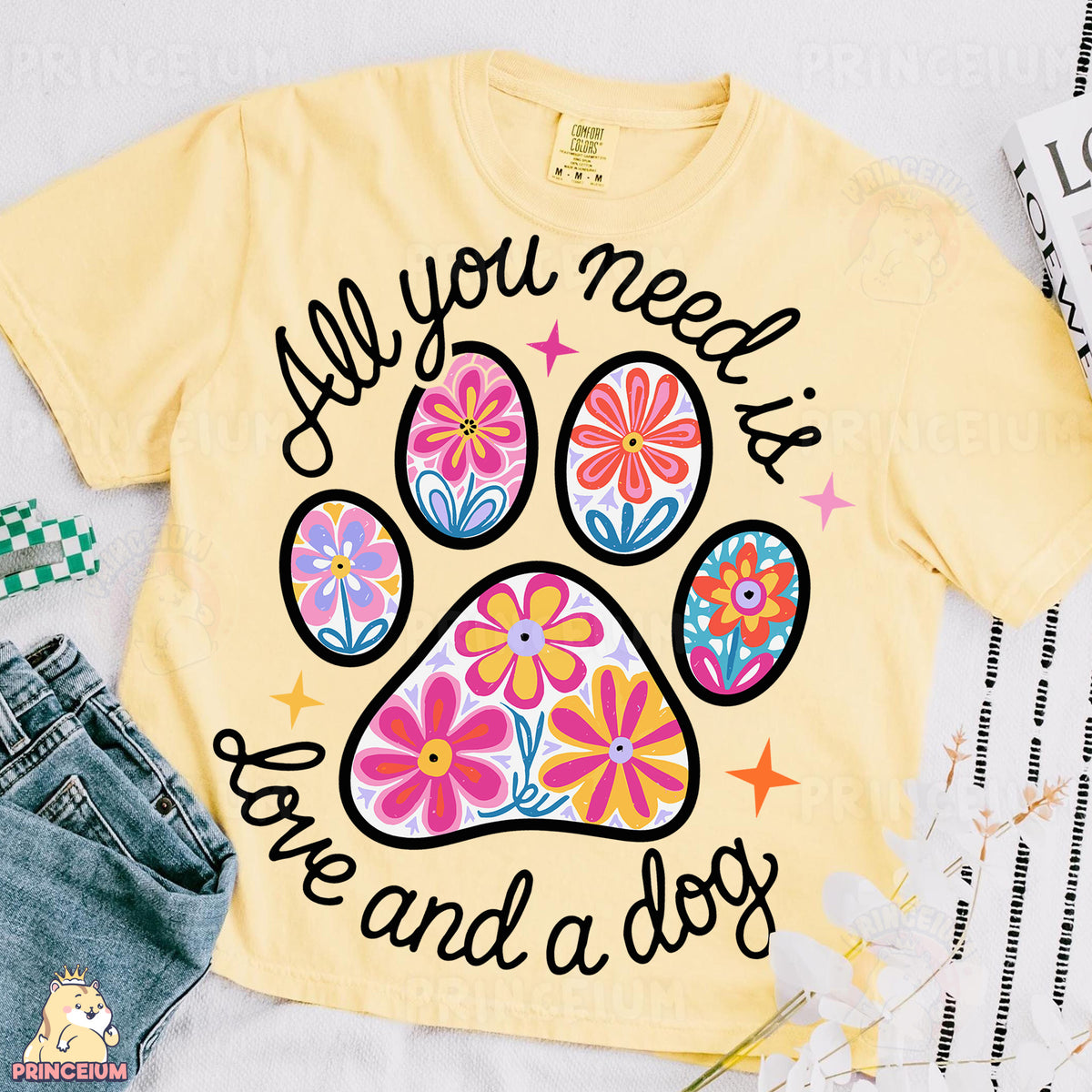 a t - shirt with a dog's paw and the words all you need