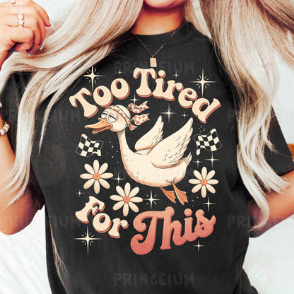 a woman wearing a t - shirt that says no tired for this