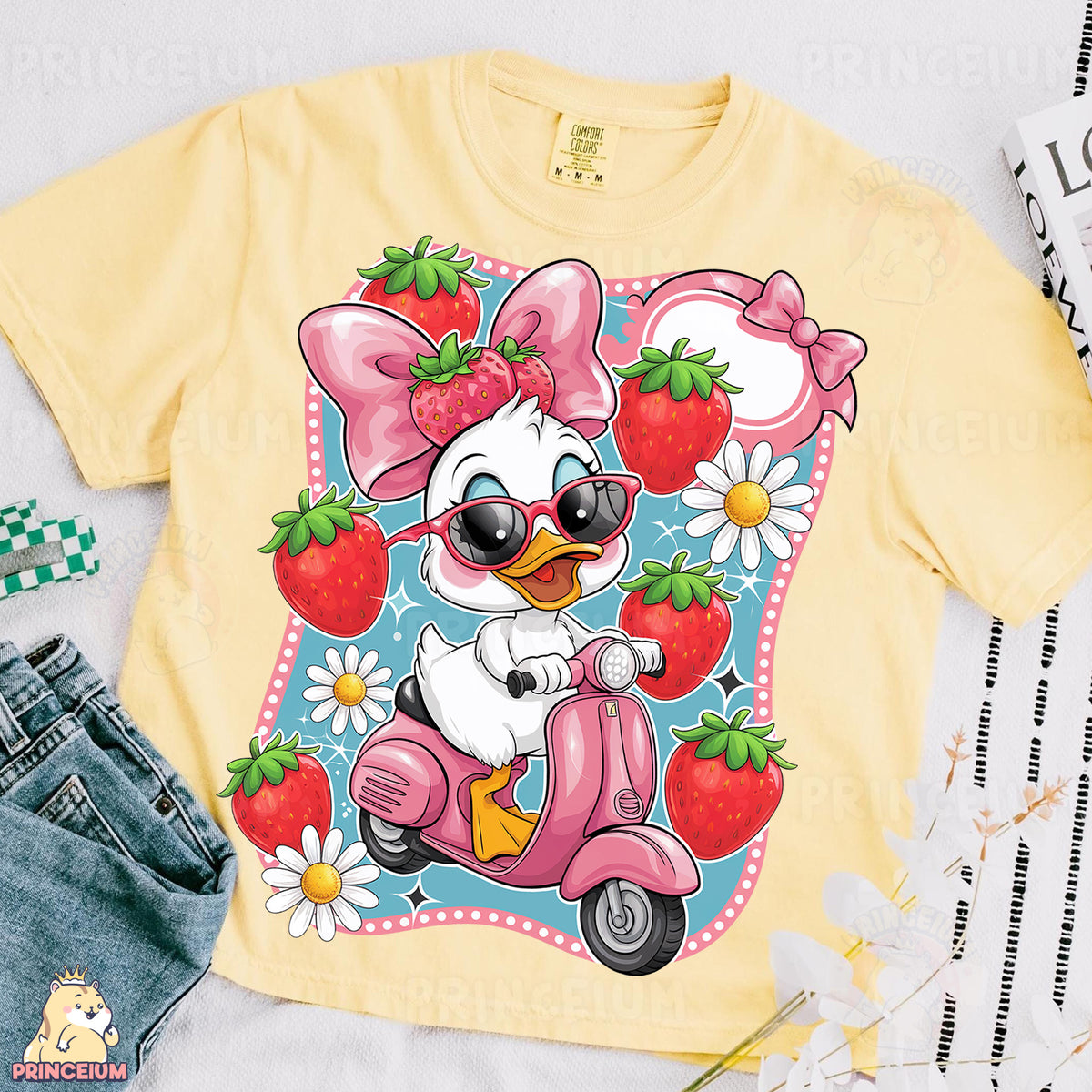 a t - shirt with an image of a duck riding a scooter