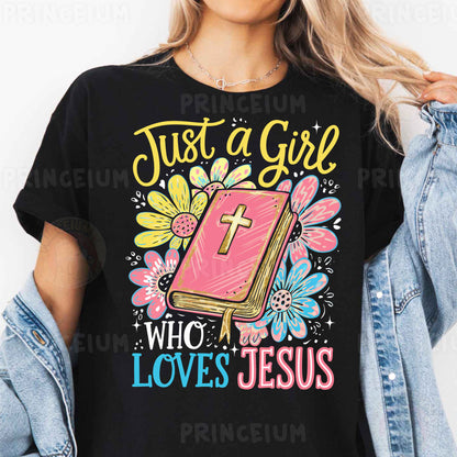 a woman wearing a t - shirt that says just a girl who loves jesus