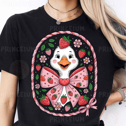 a woman wearing a t - shirt with a duck wearing a bow