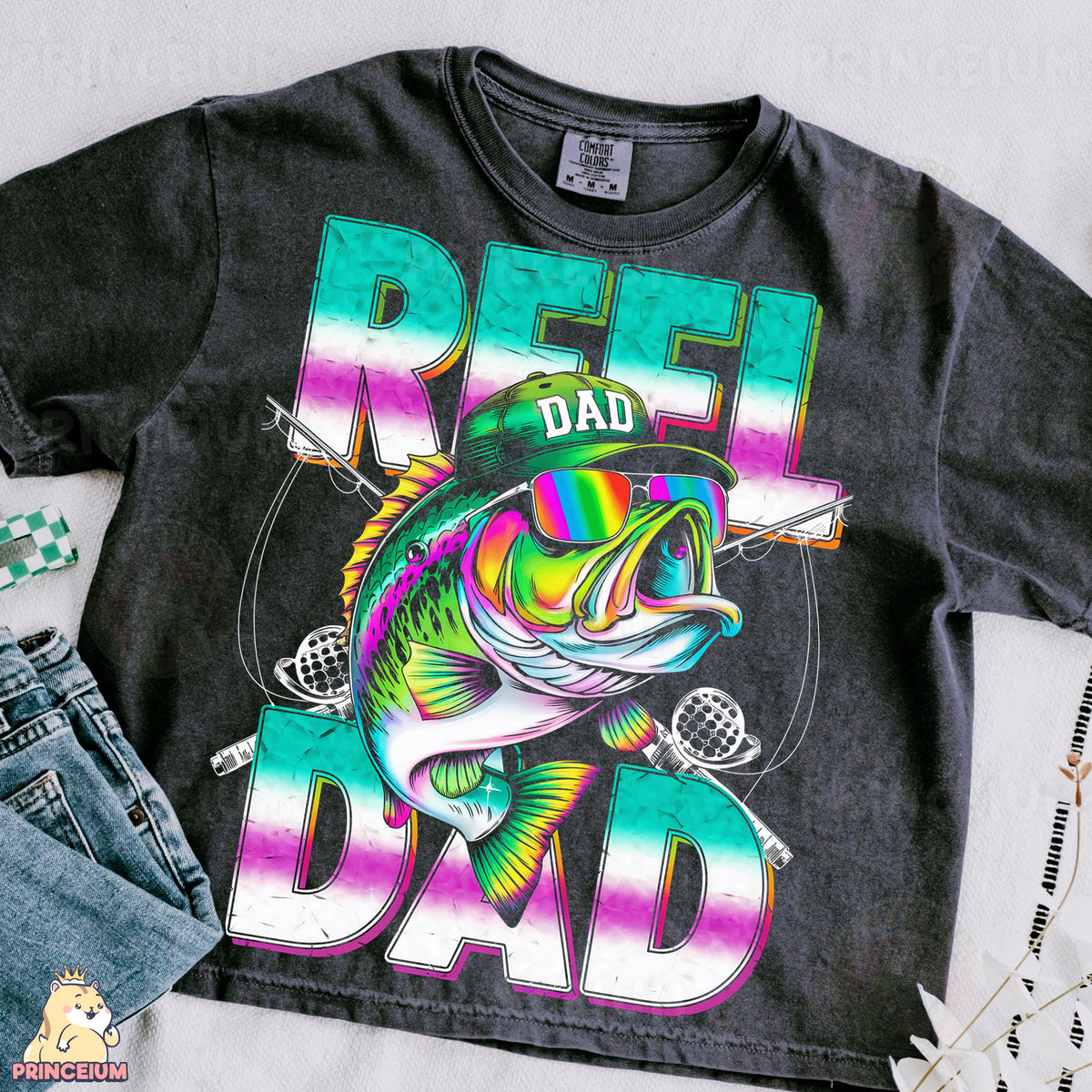 a t - shirt with a fish on it and a pair of jeans