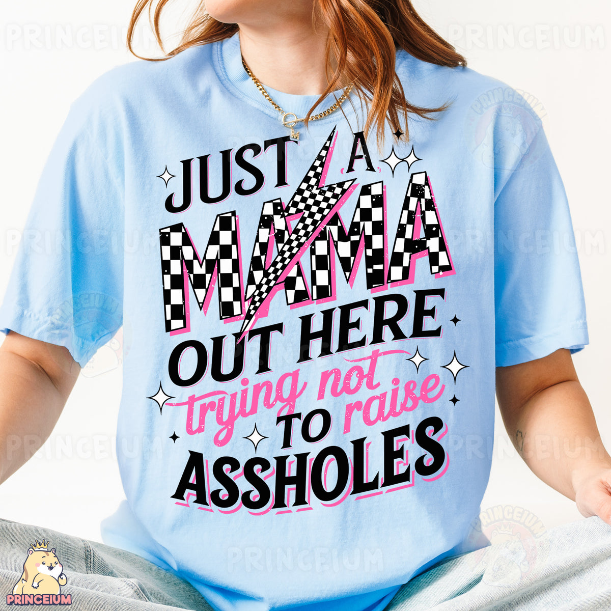 a woman wearing a blue shirt that says just a mama out here trying not to