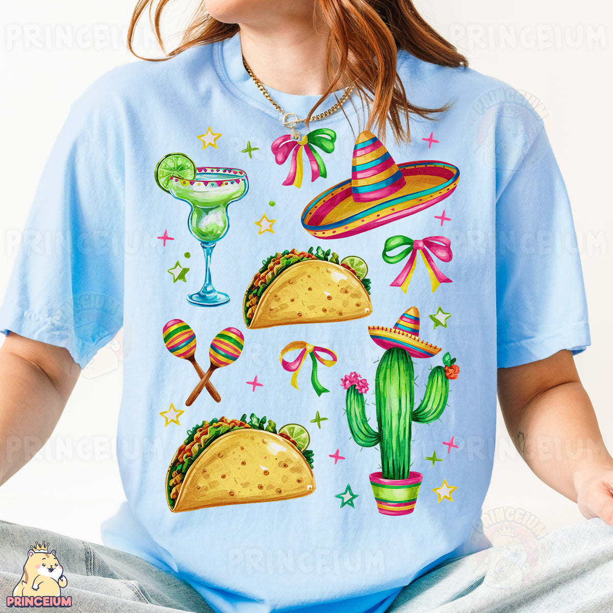 a woman wearing a blue t - shirt with tacos and sombreros on