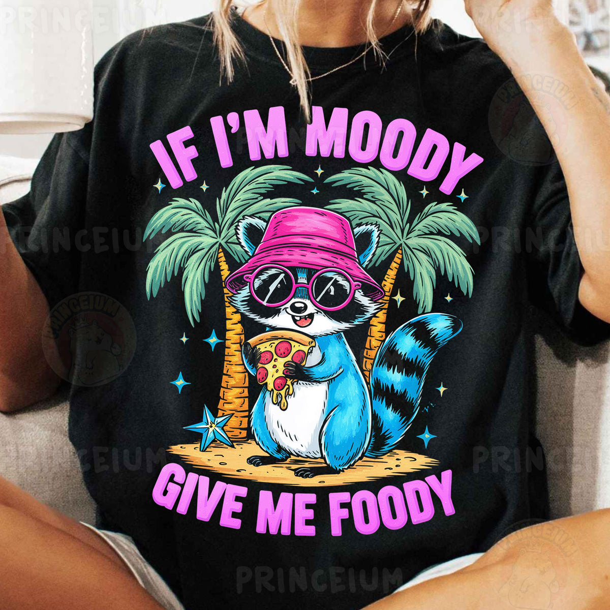 a woman wearing a black shirt with a raccoon wearing a pink hat and
