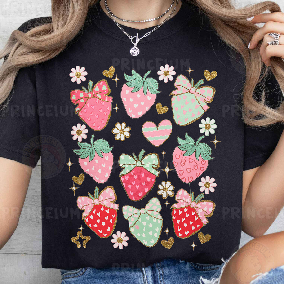 a woman wearing a t - shirt with strawberries on it