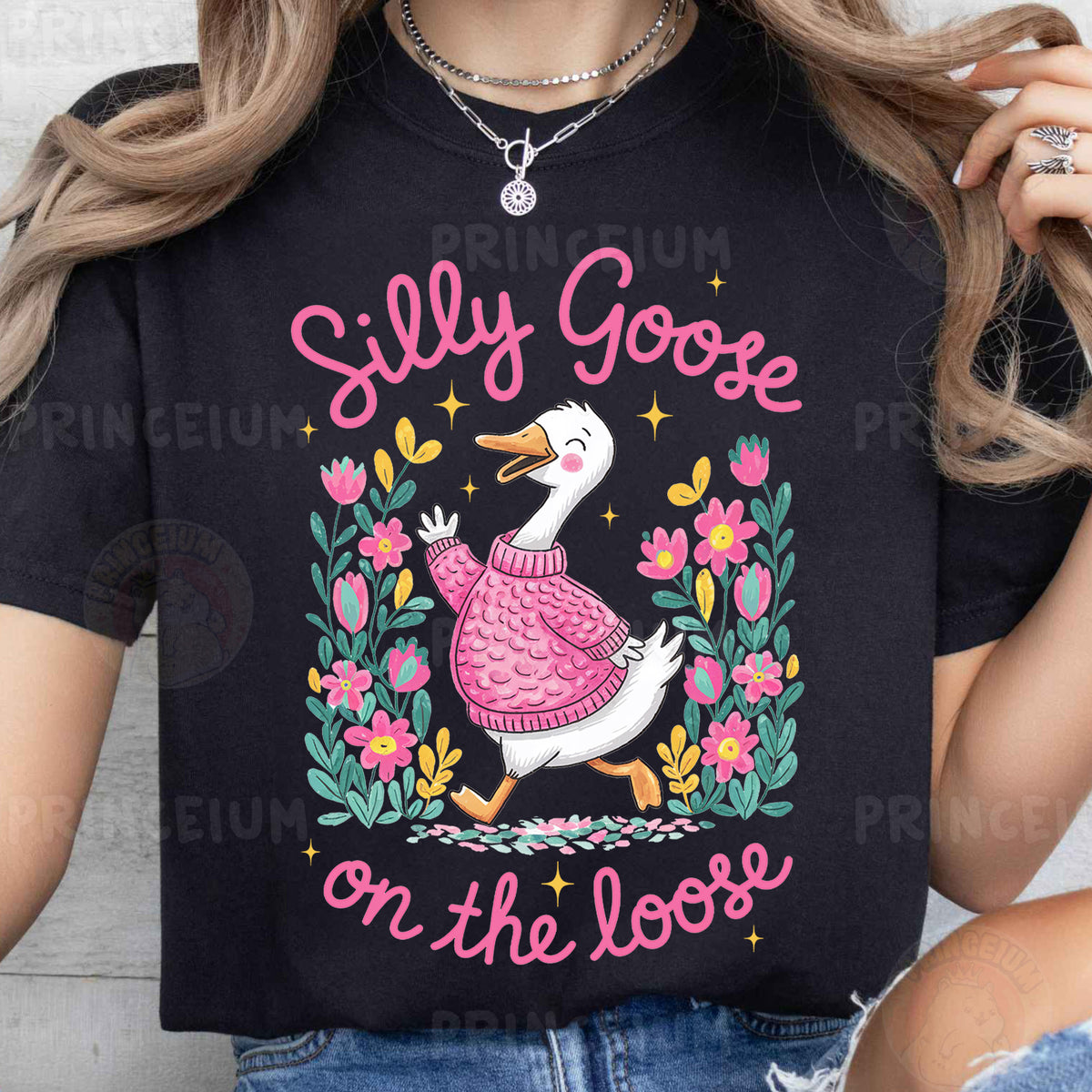 a woman wearing a t - shirt that says silly goose on the loose