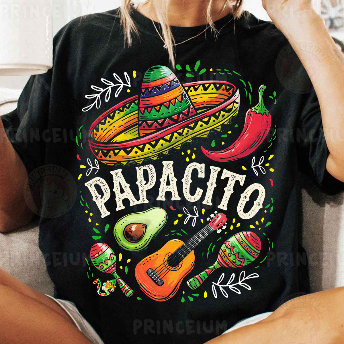 a woman sitting on a couch wearing a black shirt