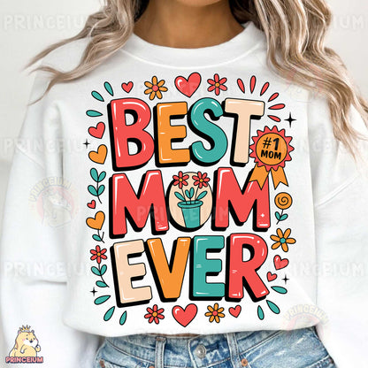 a woman wearing a white sweatshirt with the words best mom ever printed on it