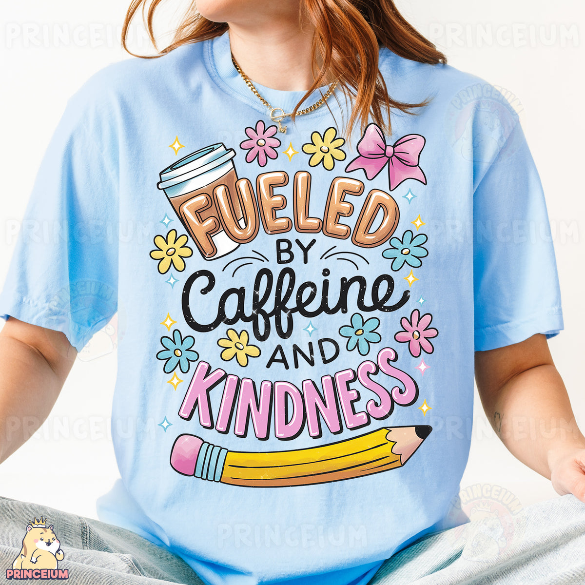 a woman wearing a t - shirt that says fueled by caffeine and kind