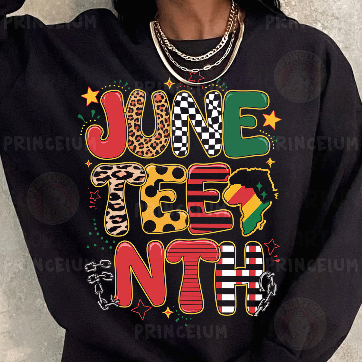 a woman wearing a black sweatshirt with a colorful graphic on it