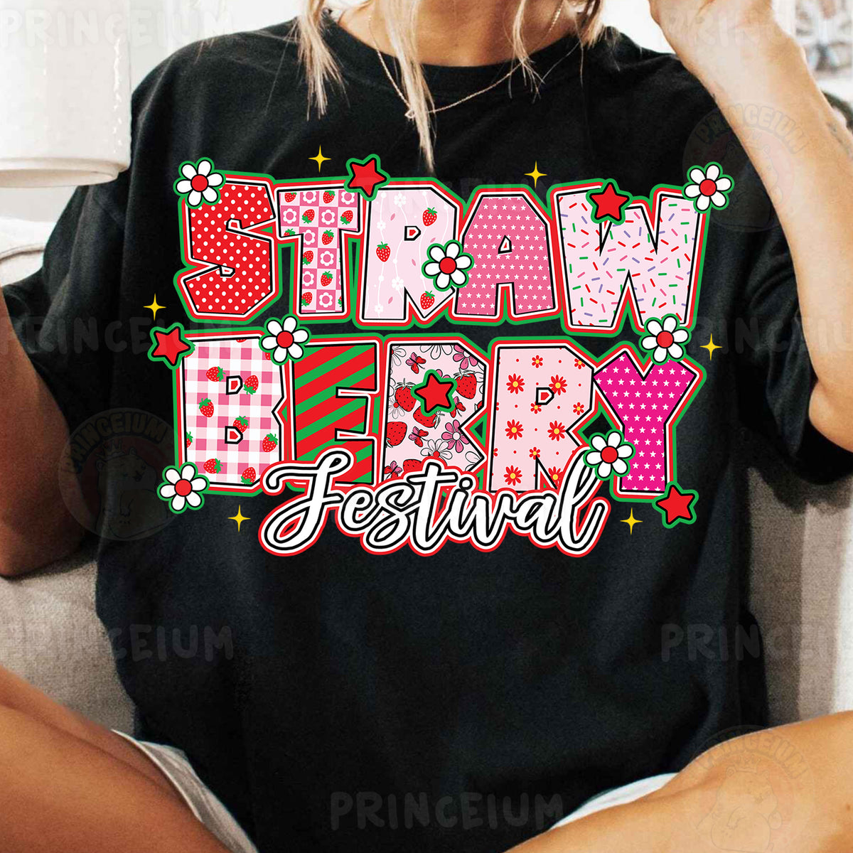 a woman sitting on a couch wearing a t - shirt with the words straw berry