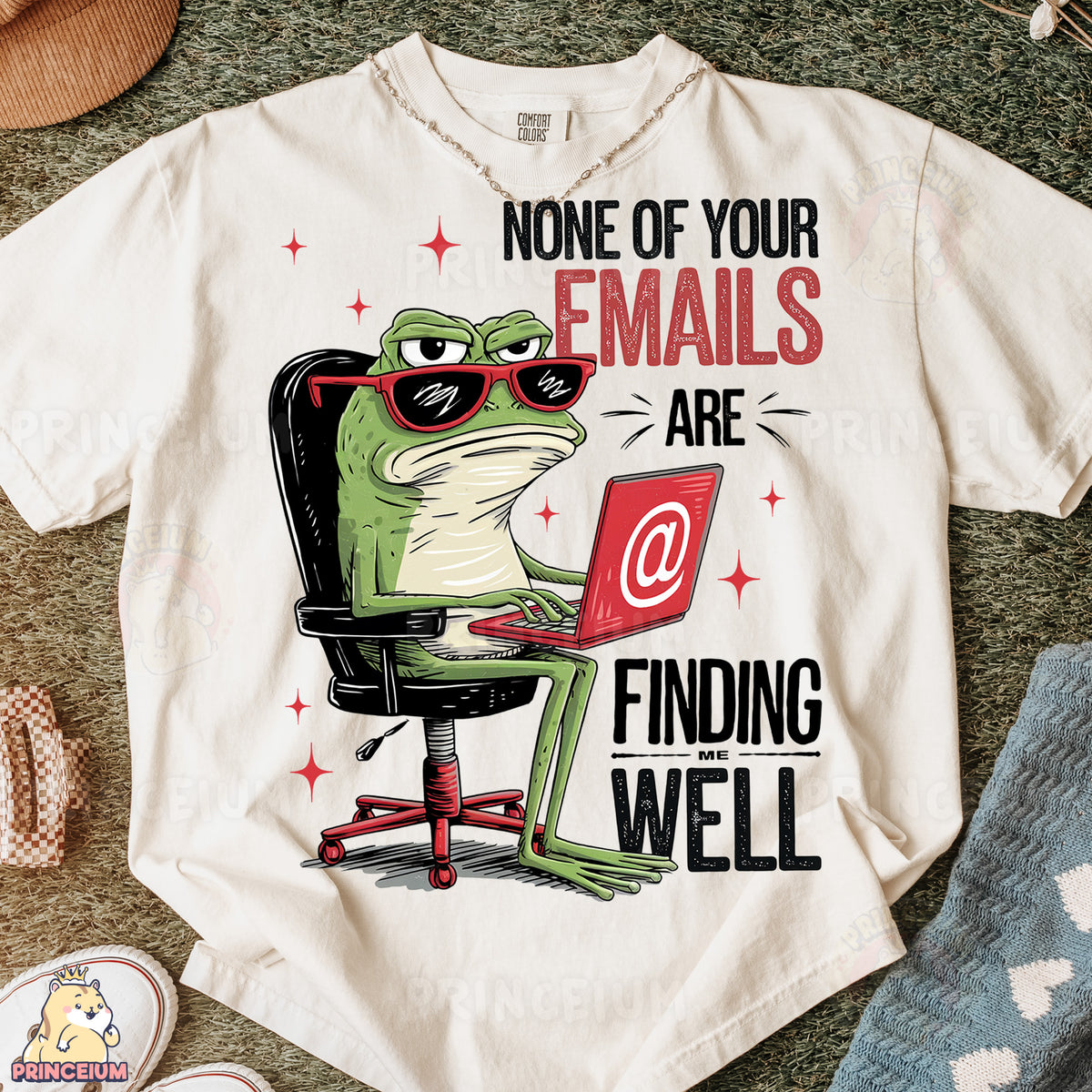 a t - shirt with a frog sitting at a computer