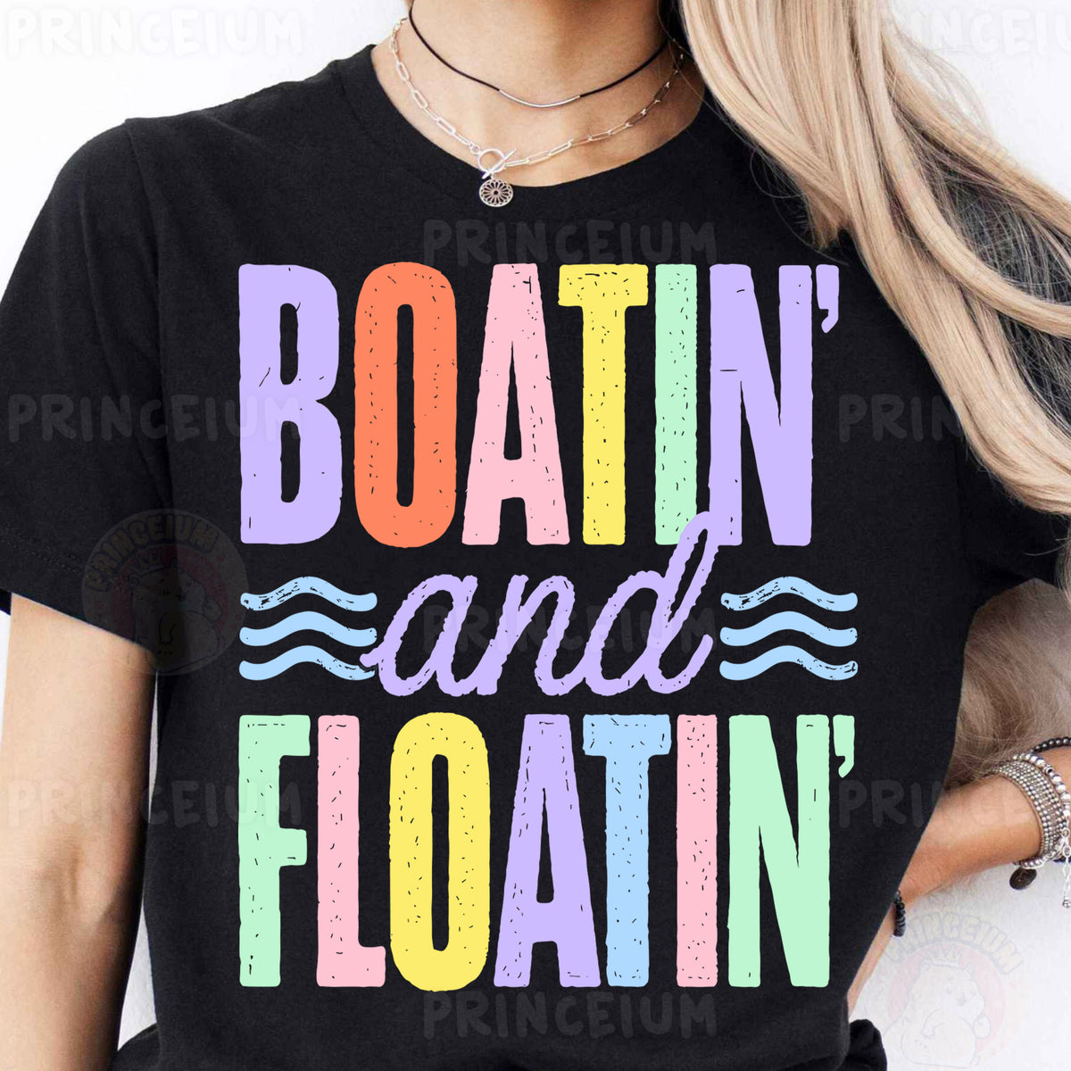 a woman wearing a black boatin and floatin shirt