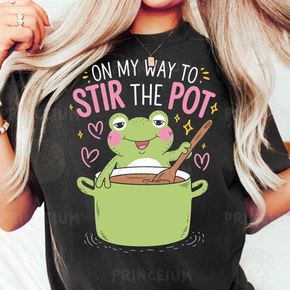 a woman wearing a t - shirt that says on my way to stir the pot