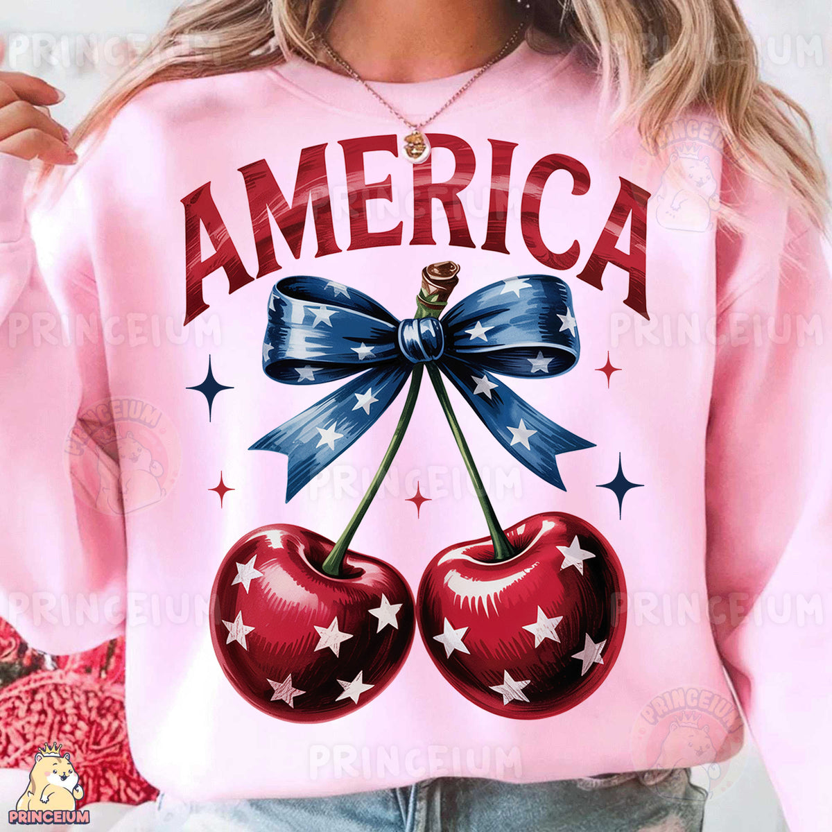 a woman wearing a pink sweatshirt with two cherries on it