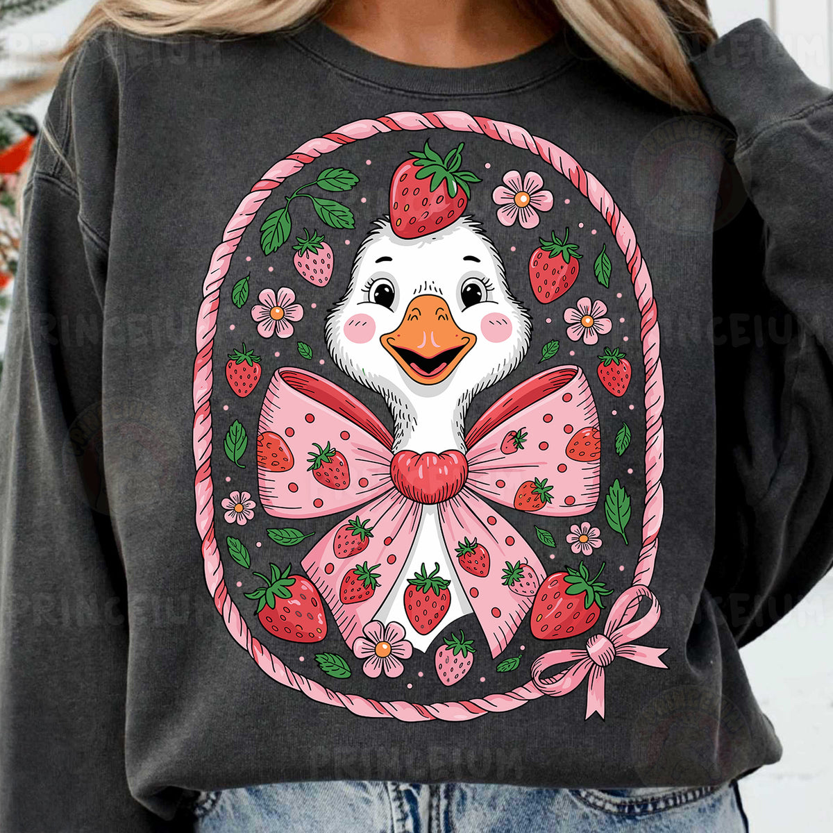 a woman wearing a sweatshirt with a duck wearing a bow