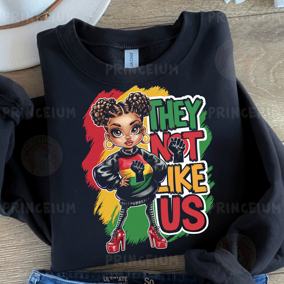 a black t - shirt with an image of a woman wearing a black jacket and
