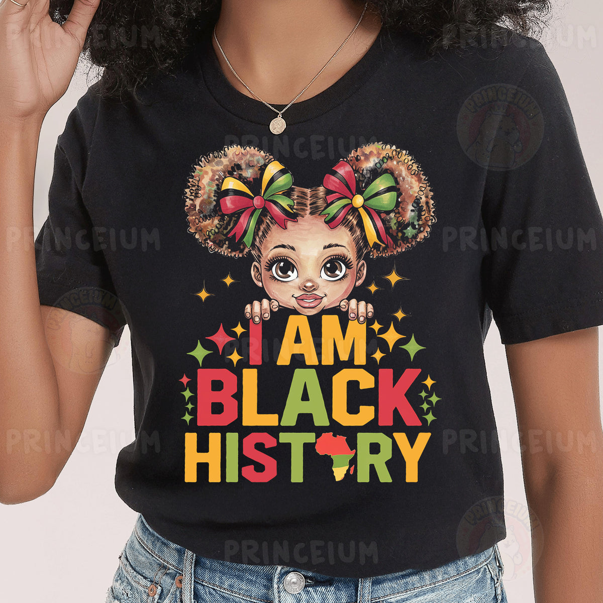 a woman wearing a black t - shirt with a cartoon character on it