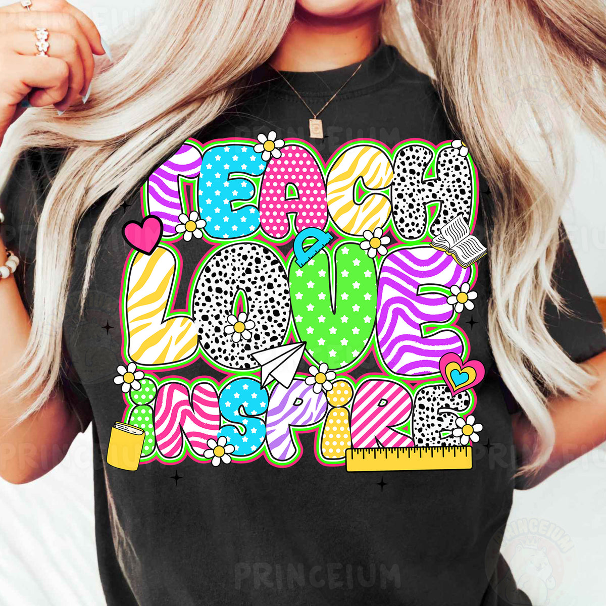 a woman wearing a black tshirt with a colorful graphic
