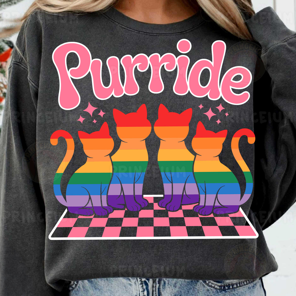 a woman wearing a sweatshirt with cats on it