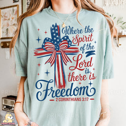 a woman wearing a t - shirt that says where the spirit of the lord is