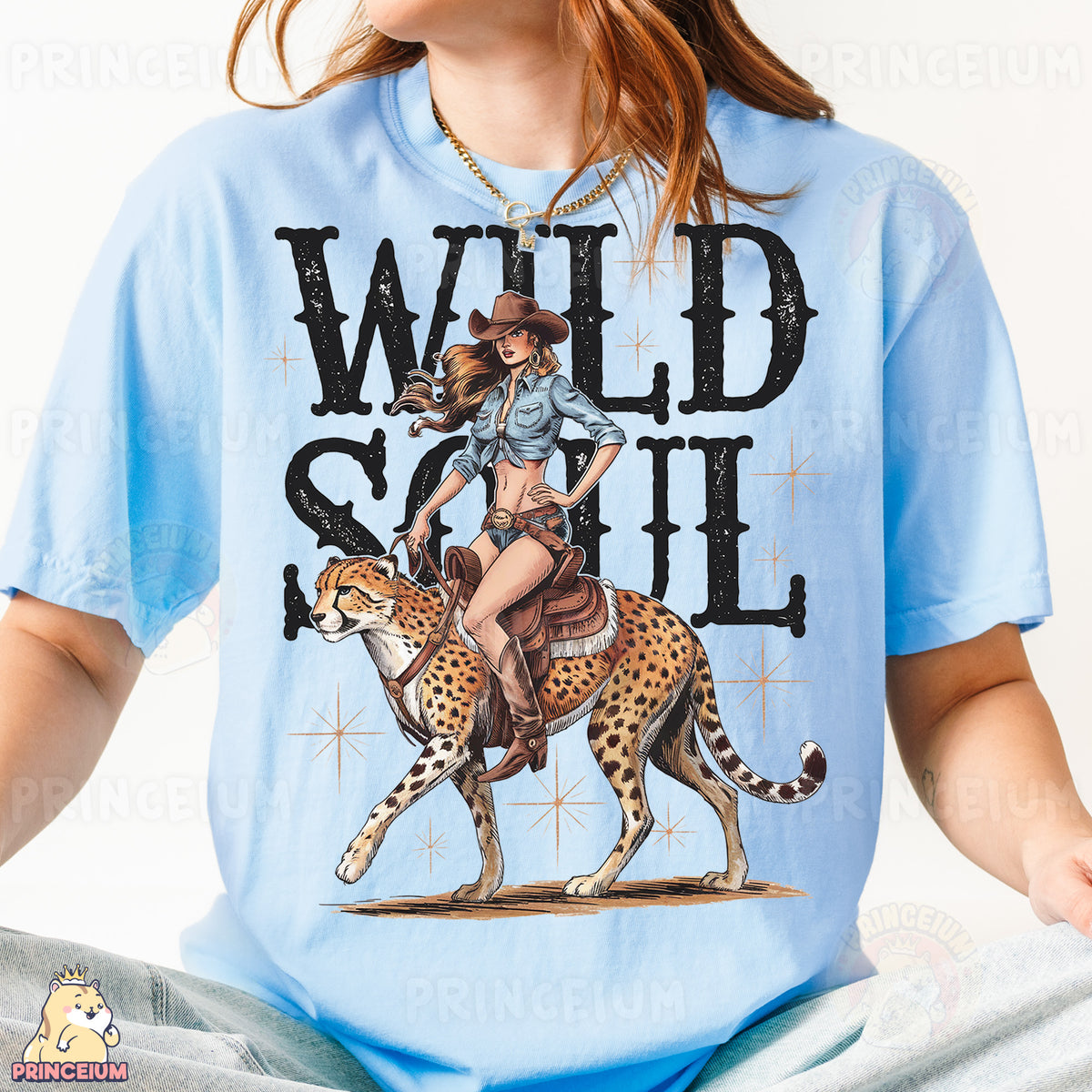 a woman sitting on a bed wearing a t - shirt with a picture of a
