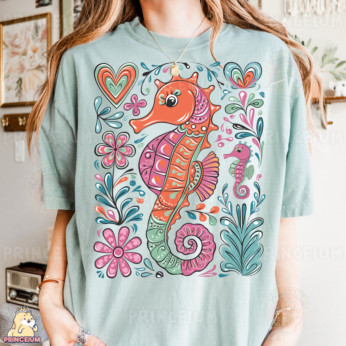 a woman wearing a t - shirt with a sea horse on it