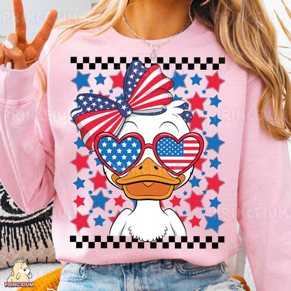 a woman wearing a pink shirt with a duck wearing sunglasses