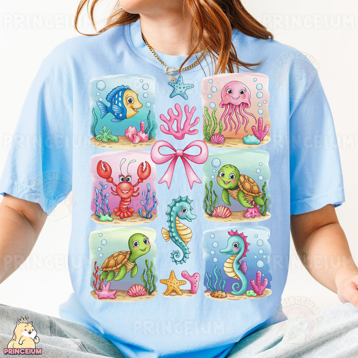 a woman wearing a blue shirt with sea animals on it