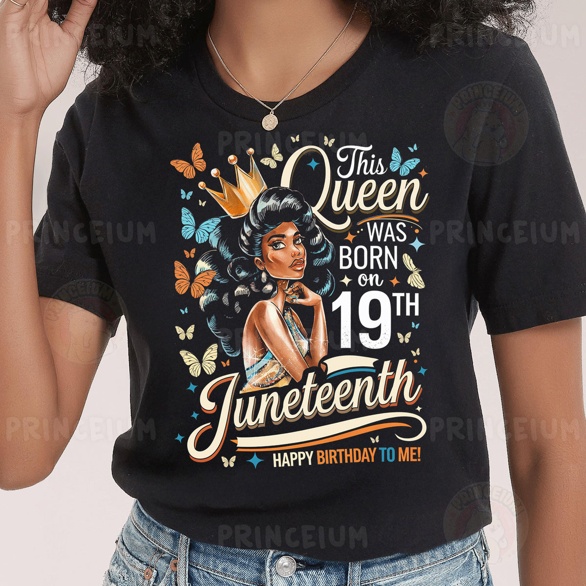 a woman wearing a black shirt with a picture of a woman on it