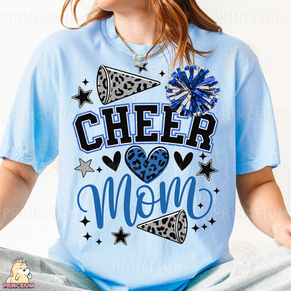 a young girl wearing a cheer mom shirt