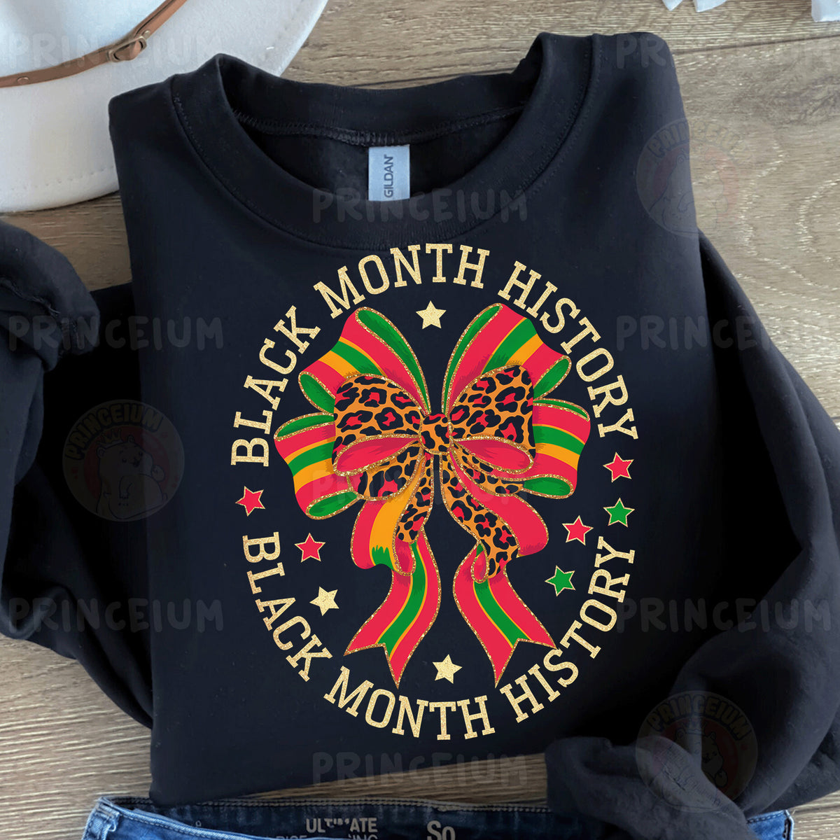a black shirt with a bow on it