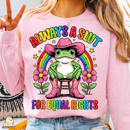 a woman wearing a pink shirt with a frog on it