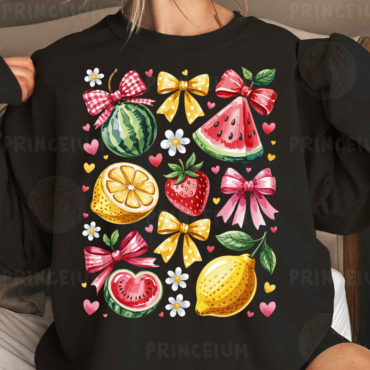 a woman wearing a black shirt with fruit on it