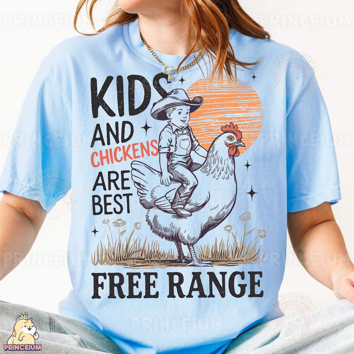 a girl wearing a blue shirt with a chicken on it
