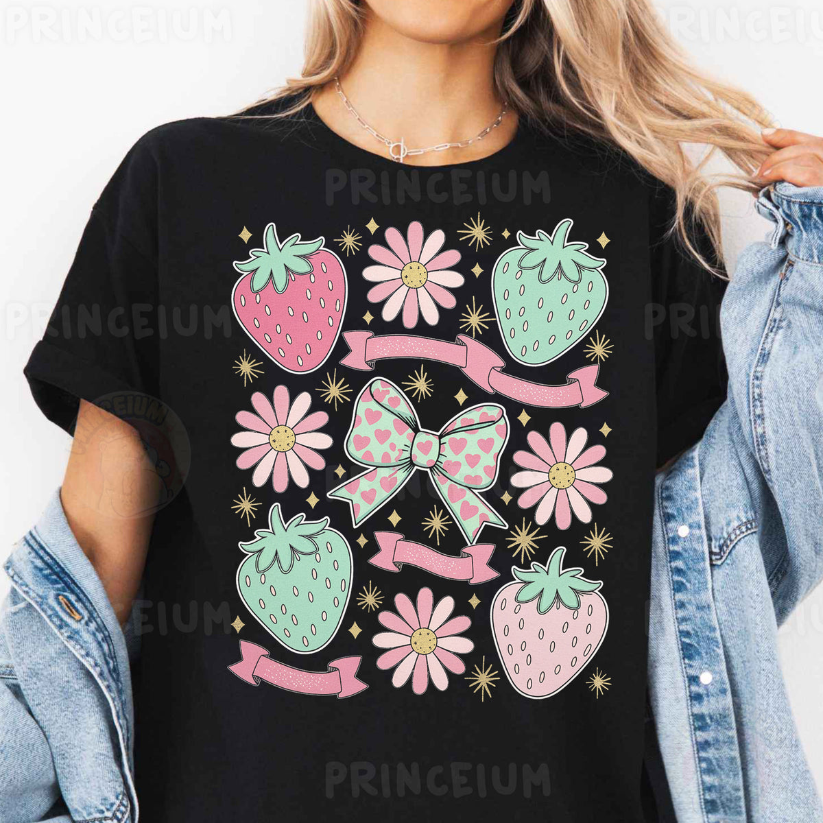 a woman wearing a black shirt with pink flowers and strawberries on it