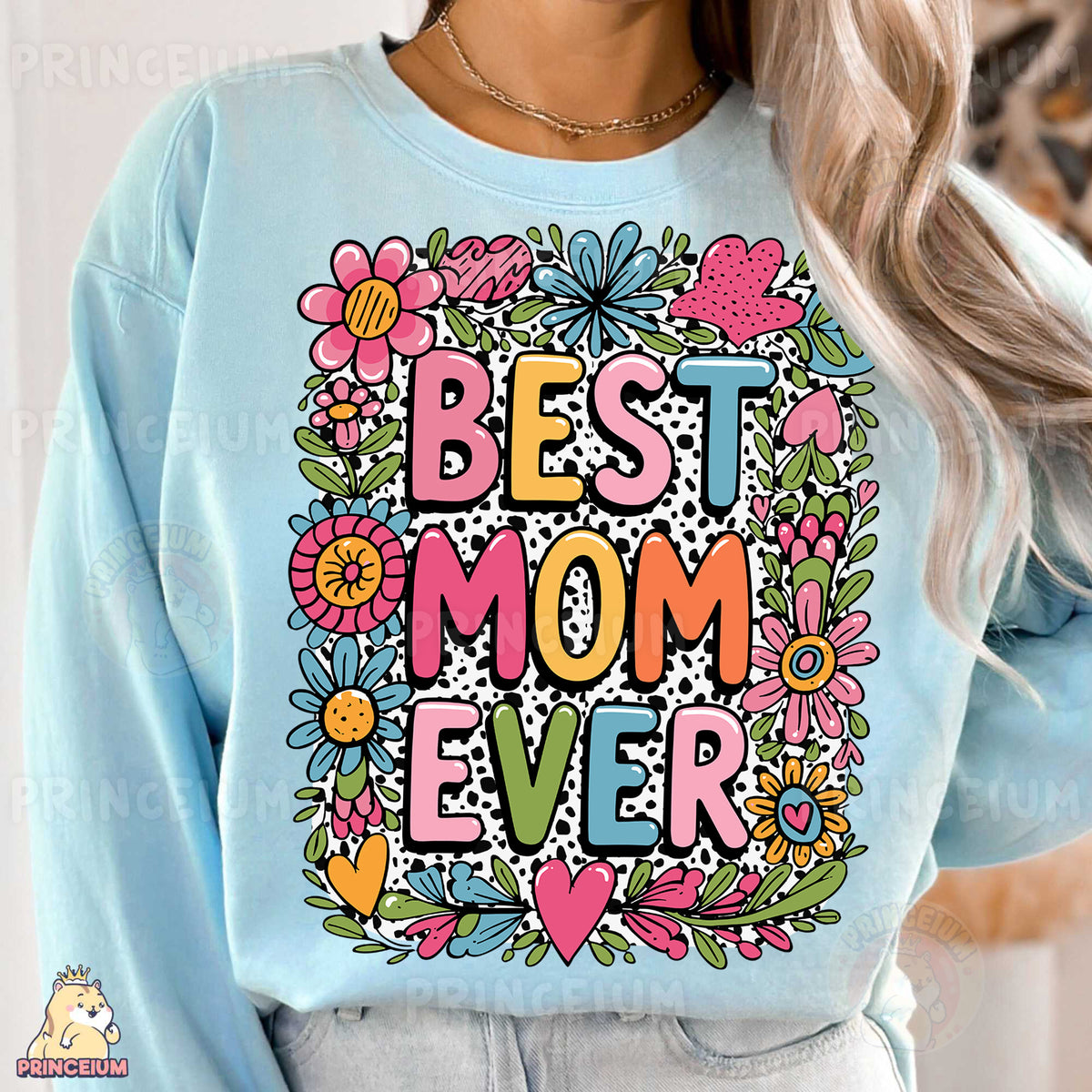 a woman wearing a blue sweatshirt with the words best mom ever printed on it