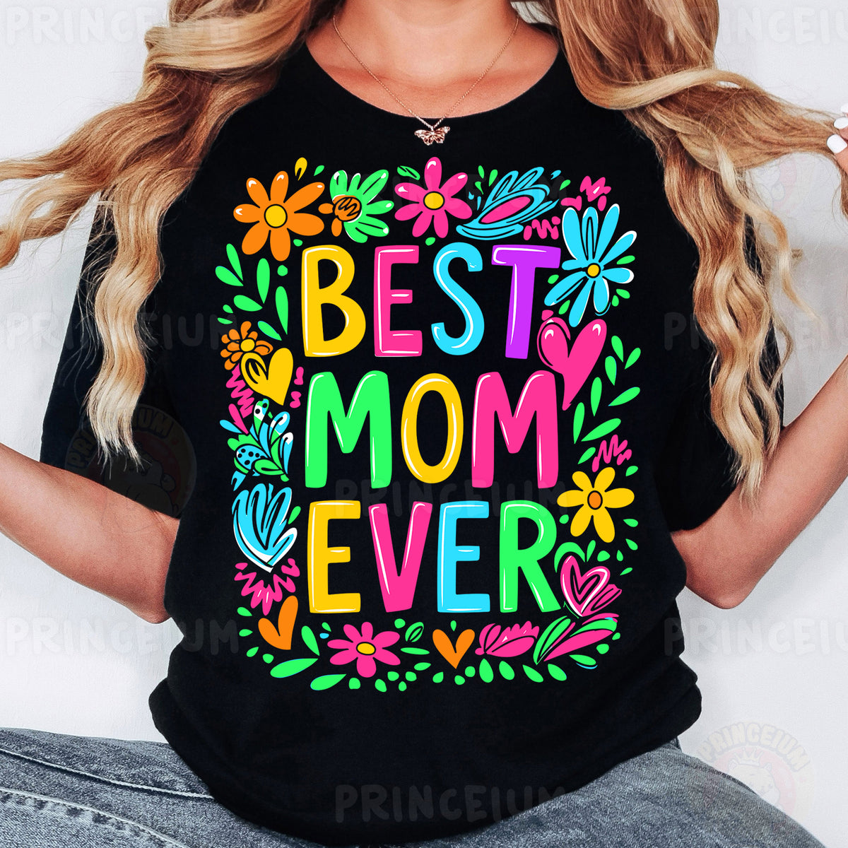 a woman wearing a black best mom ever t - shirt