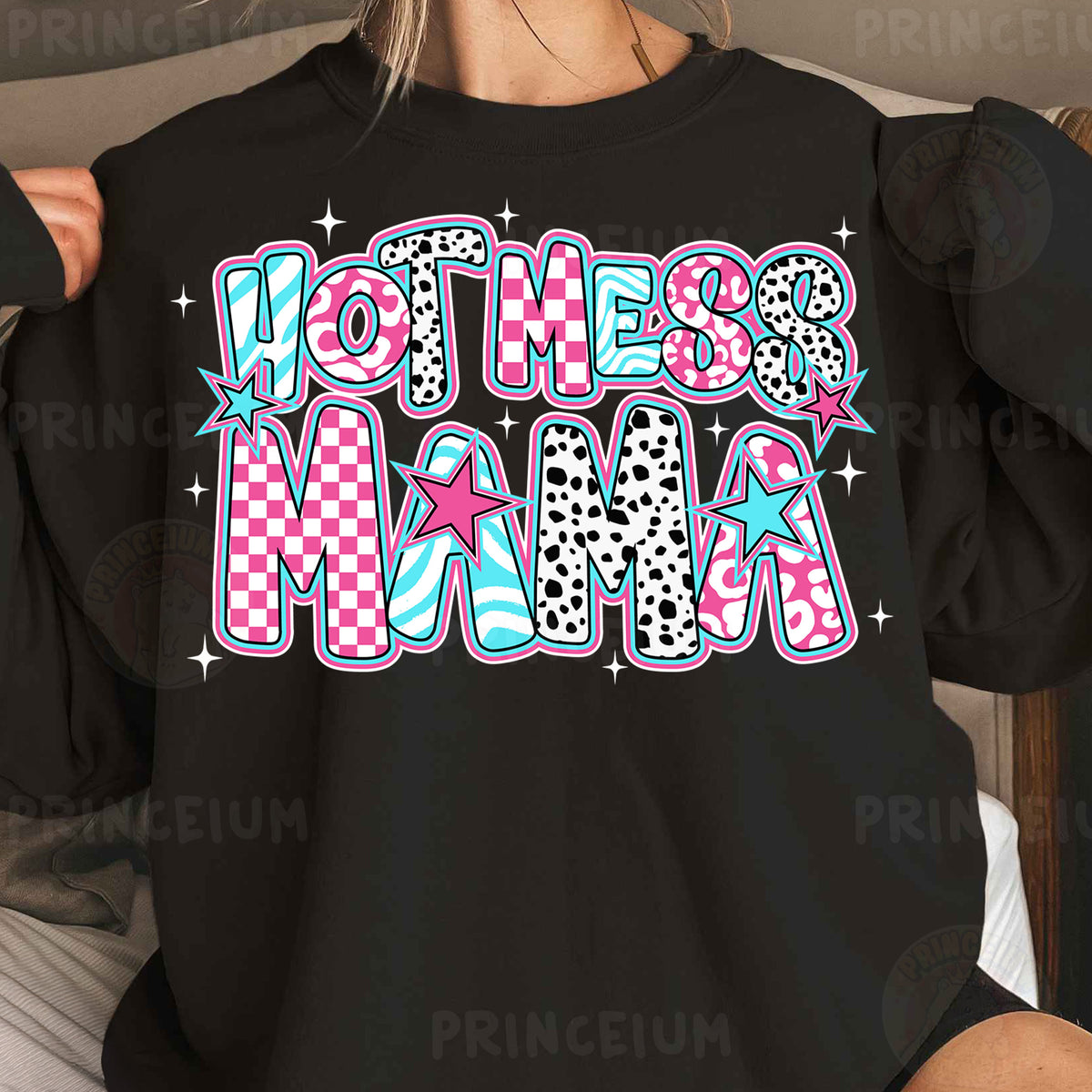 a woman wearing a black sweatshirt with the words'women's mania'printed