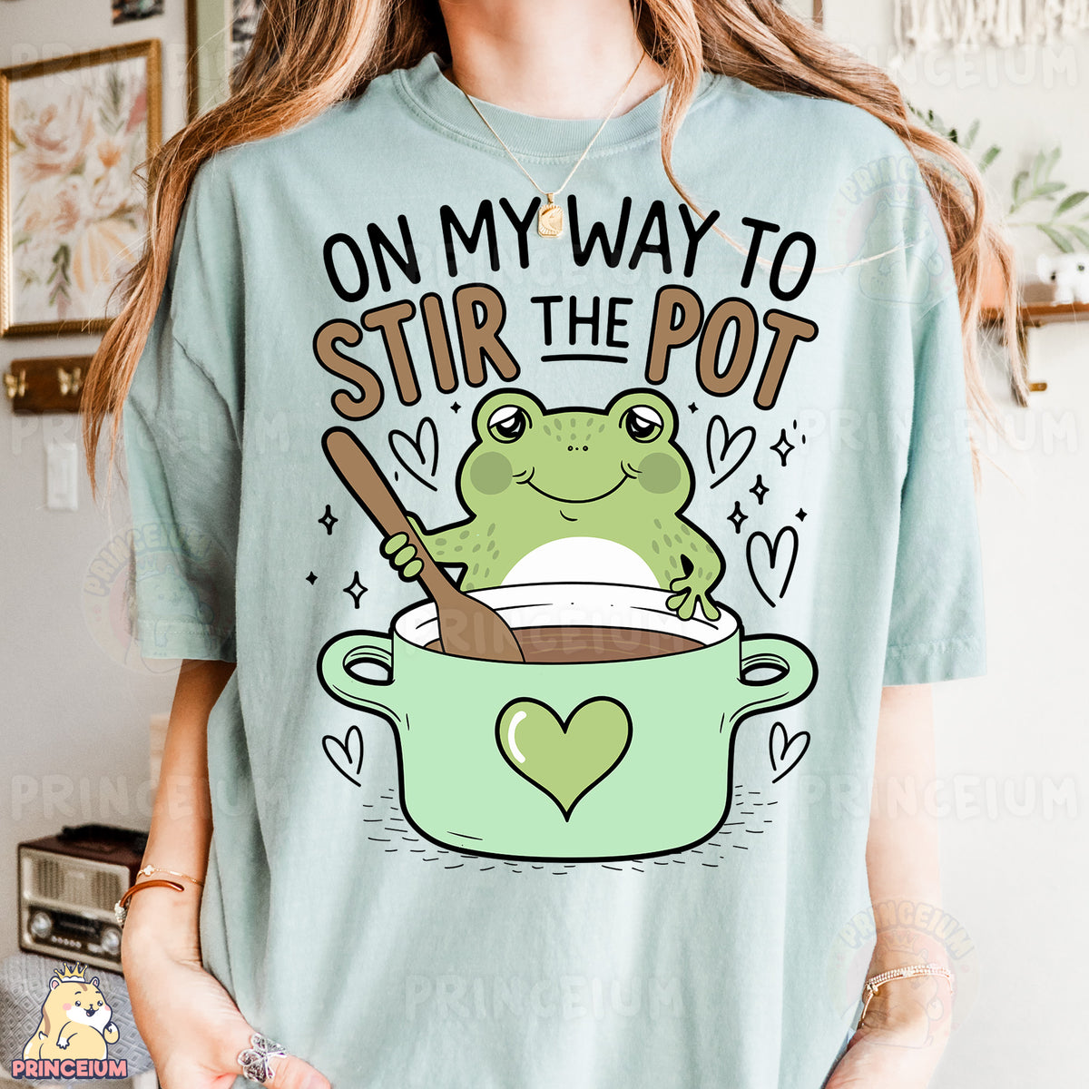 a woman wearing a t - shirt that says on my way to stir the pot