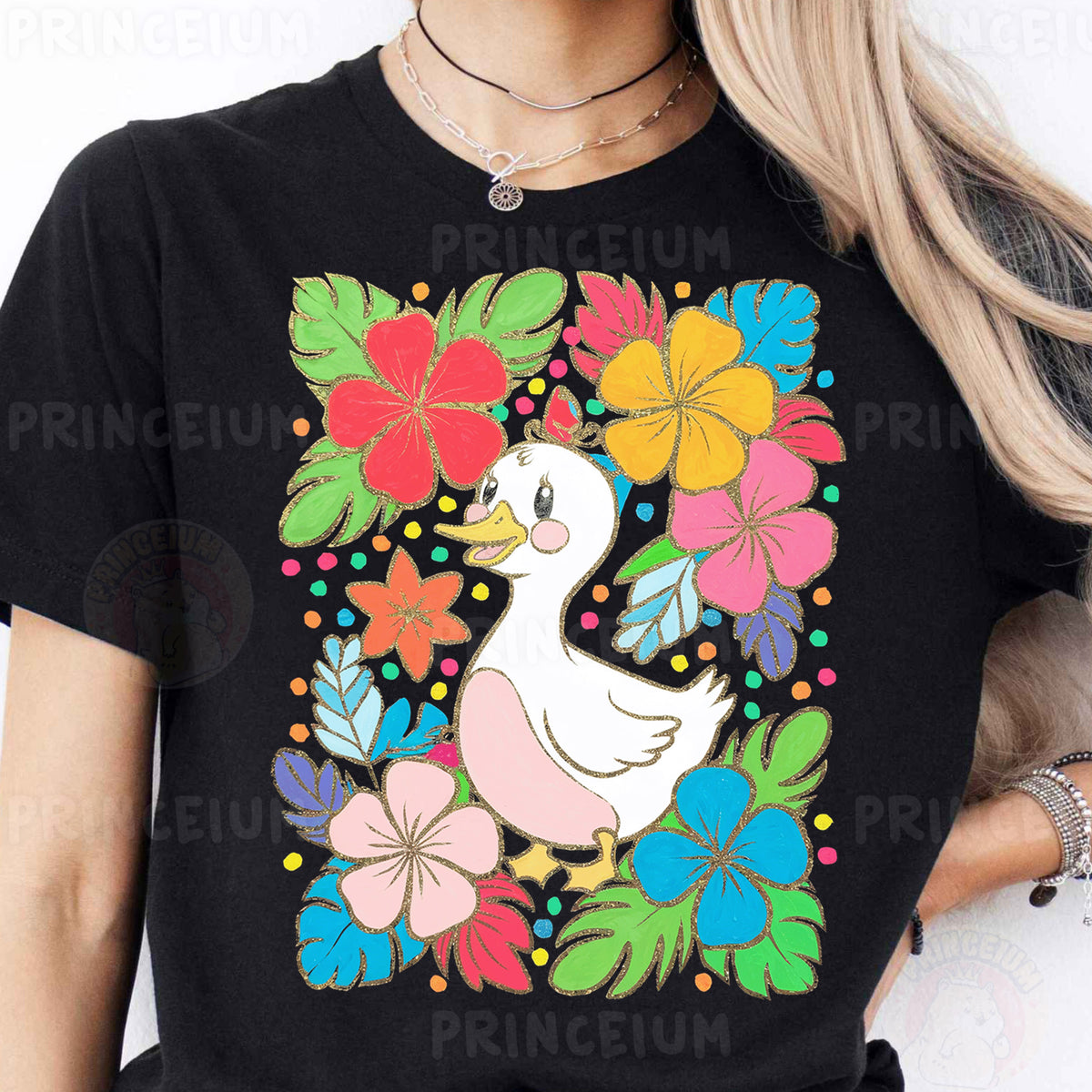 a woman wearing a black t - shirt with a duck and flowers on it
