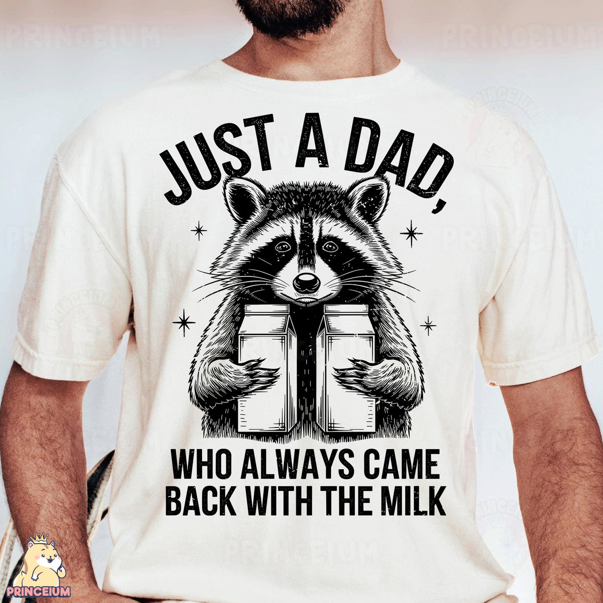 a man wearing a t - shirt with a raccoon reading a book