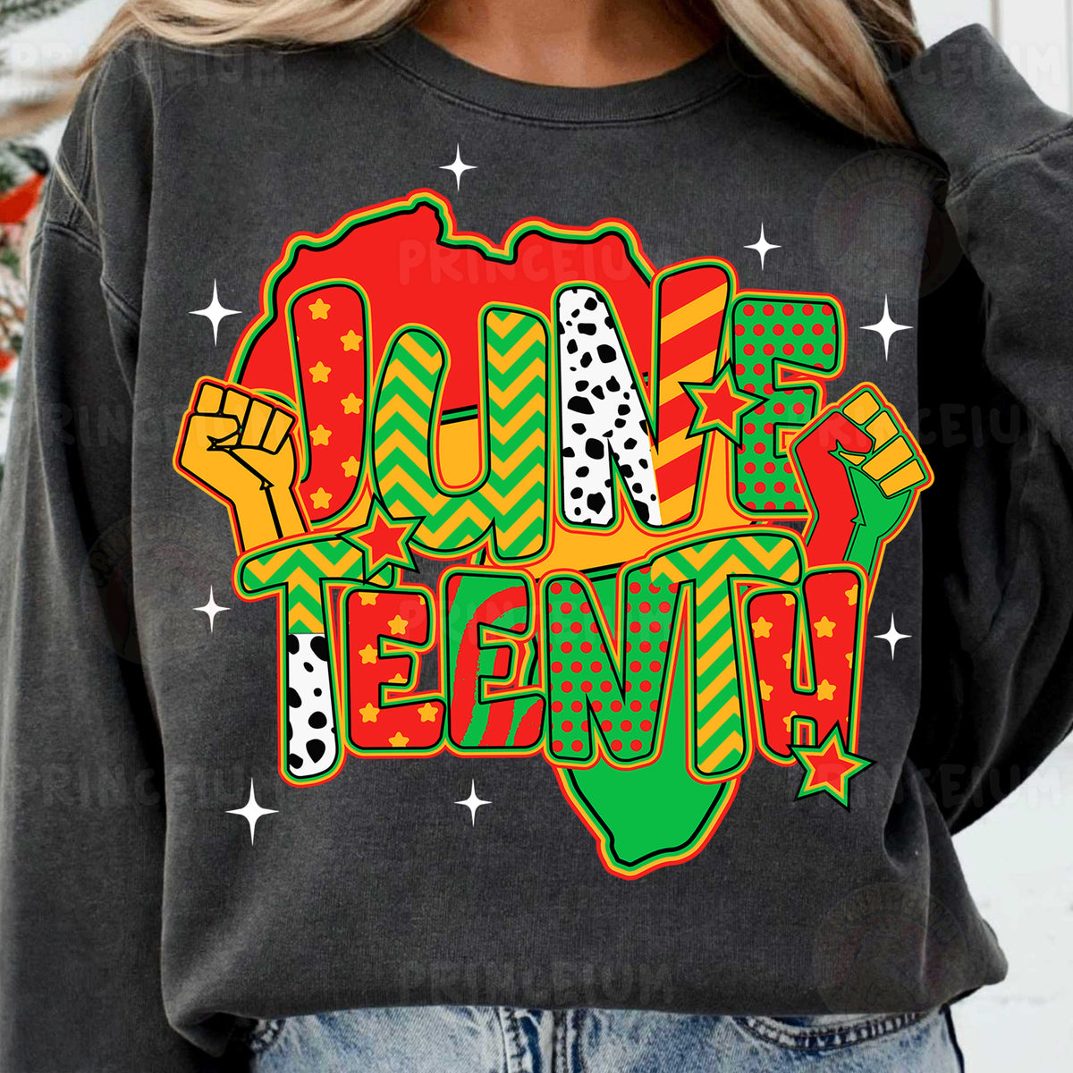 a woman wearing a black sweatshirt with the word africa printed on it