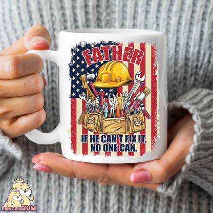 a woman holding a coffee mug with a picture of a construction worker