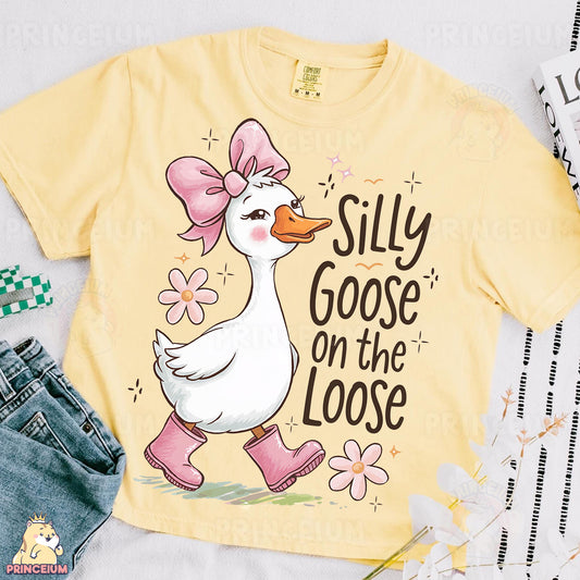 a yellow shirt with a duck wearing pink boots