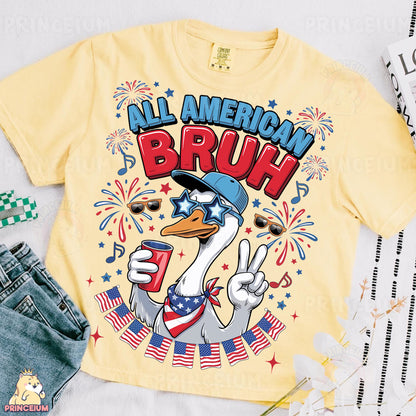 a yellow shirt with an image of a duck wearing a hat