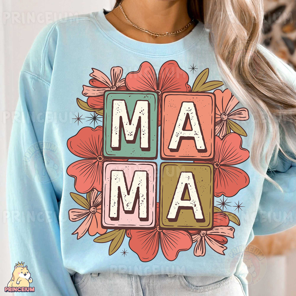 a woman wearing a blue sweatshirt with the word mama printed on it